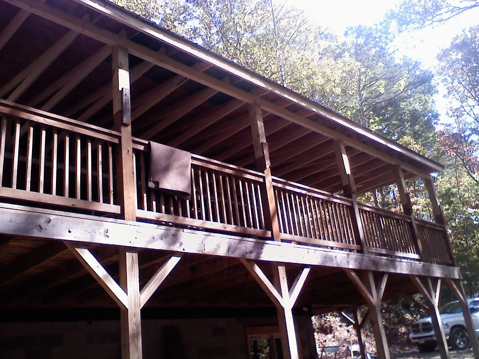 Timber framing under a new elevated porch and deck — Roof Leak Repair in Pennellville by Roofing Brothers